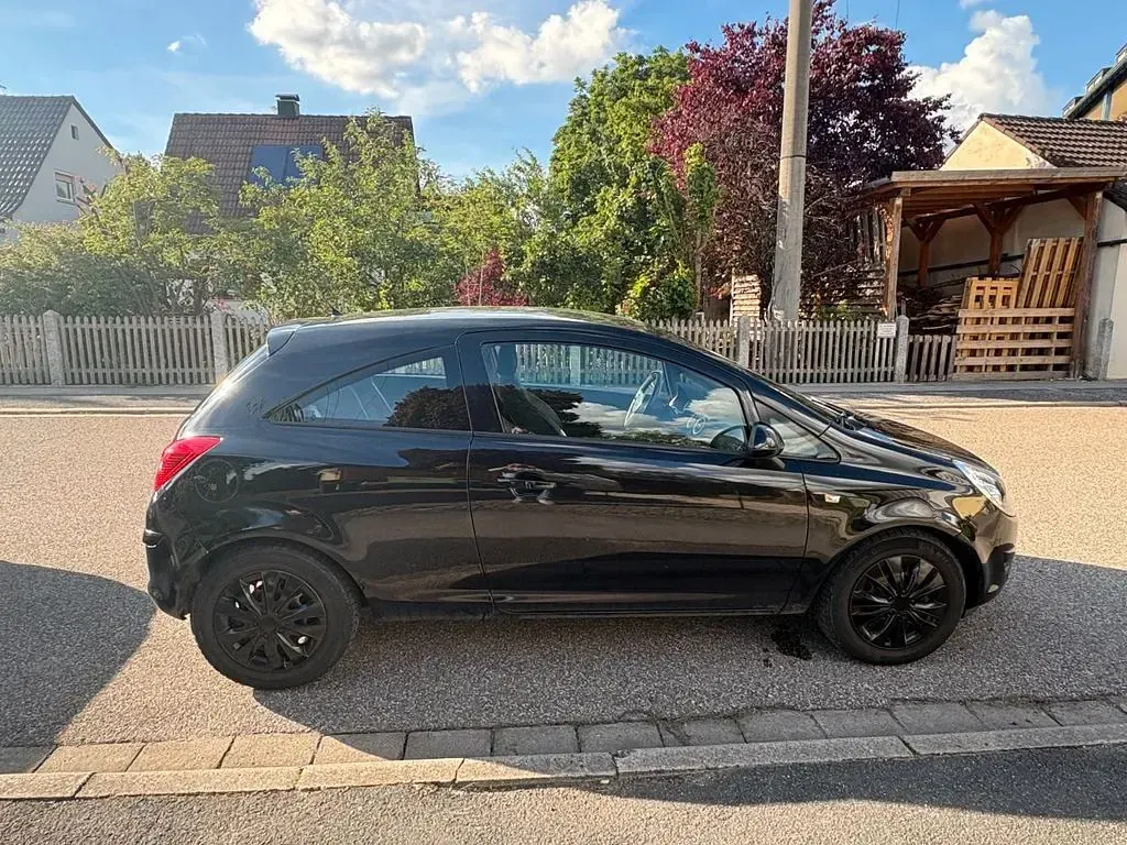 Używany Opel Corsa 80 KM (58 kW) 2009 Czarny Hatchback