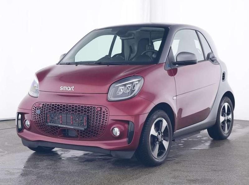 Rot Gebraucht 2024 Smart ForTwo Coupé Passion Exclusive Kleinwagen | 17.777 € (Fairer Preis) - Bild 1/3