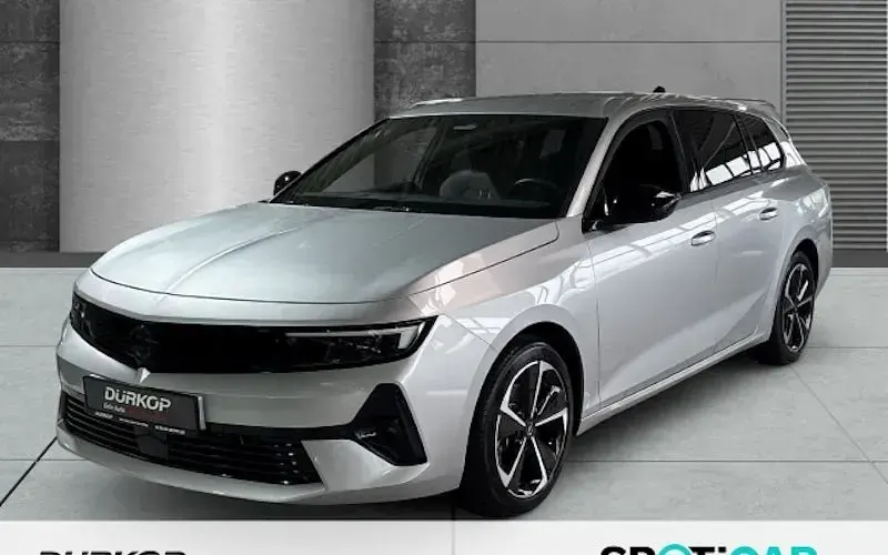 Używany Opel Astra 130 KM (95 kW) 2024 Srebrny Kombi