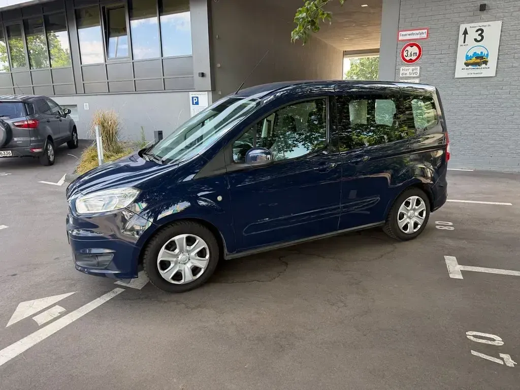 Gebraucht Ford Tourneo Courier Trend 101 PS (74 kW) 2015 Blau Van / Kleinbus