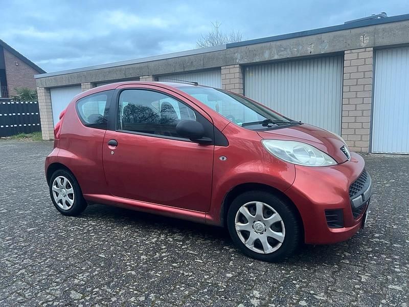 Gebraucht Peugeot 107 68 PS (50 kW) 2010 Orange Kleinwagen