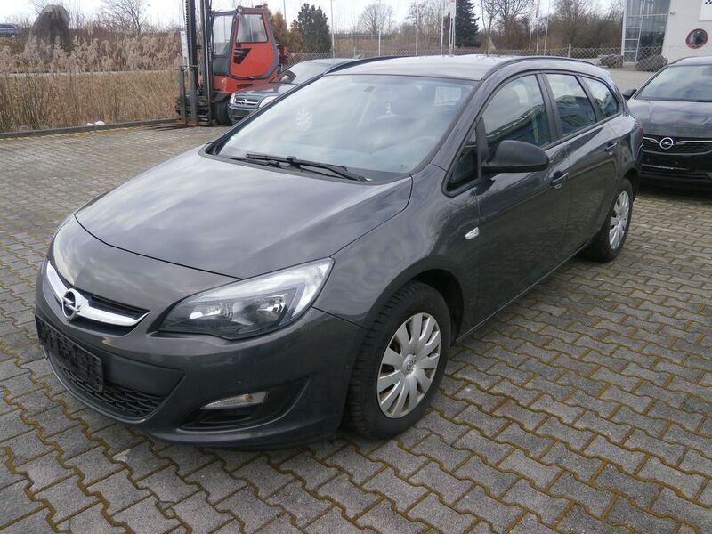 Grau Gebraucht 2015 Opel Astra Edition Kombi | 1.990 € - Bild 1/4