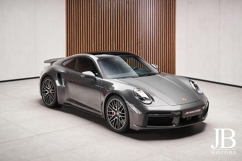 Achatgrau Gebraucht 2021 Porsche 992 Coupé | 177.850 € - Bild 1/4