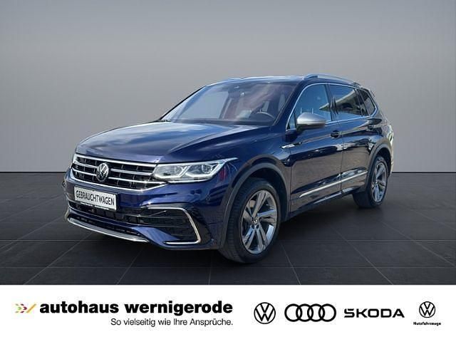 Blau Gebraucht 2023 VW Tiguan Allspace R-line SUV | 42.939 € (Teuer) - Bild 1/4