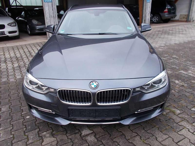 Mineralgrau Gebraucht 2014 BMW 318 Luxury Line Kombi | 8.990 € (Fairer Preis) - Bild 1/4