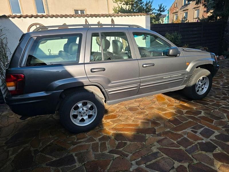 Grau Gebraucht 2002 Jeep Grand Cherokee Limited SUV | 8.500 € (Fairer Preis) - Bild 1/4