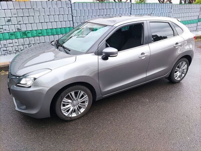 Grau Gebraucht 2017 Suzuki Baleno Comfort Limousine | 12.980 € (Fairer Preis) - Bild 1/4