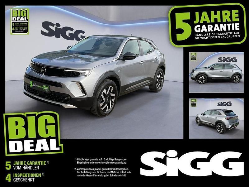 Gebraucht Opel Mokka Elegance 101 PS (74 kW) 2022 Kontrast grau/quarz silber SUV