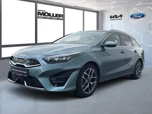 Gebraucht Kia Ceed Sportswagon Platinum 141 PS (103 kW) 2023 Usg) yucca stahlgrau met. (grau Kombi