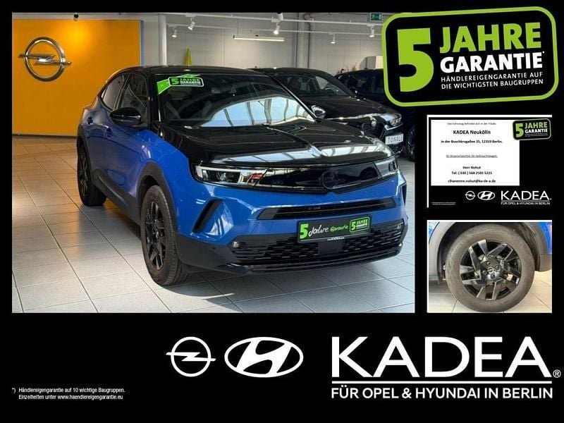 Gebraucht Opel Mokka-e 100 kW (136 PS) 2023 Perl blau/voltaik blau (metallic) SUV