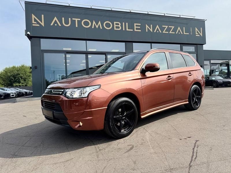 Braun Gebraucht 2013 Mitsubishi Outlander Invite SUV | 10.999 € (Teuer) - Bild 1/4