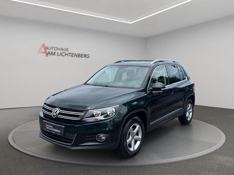 Dunkelgruen Gebraucht 2012 VW Tiguan Sportline SUV | 8.870 € (Fairer Preis) - Bild 1/4
