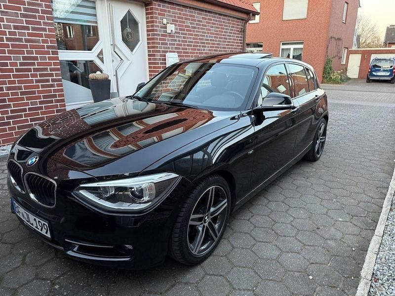 Schwarz Gebraucht 2013 BMW 120 Sport Line Kleinwagen | 12.500 € (Fairer Preis) - Bild 1/4