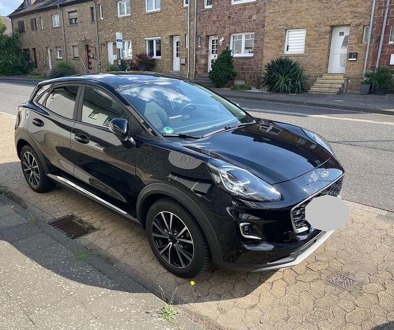 Schwarz Gebraucht 2023 Ford Puma Gen-E Titanium SUV | 16.999 € - Bild 1/4