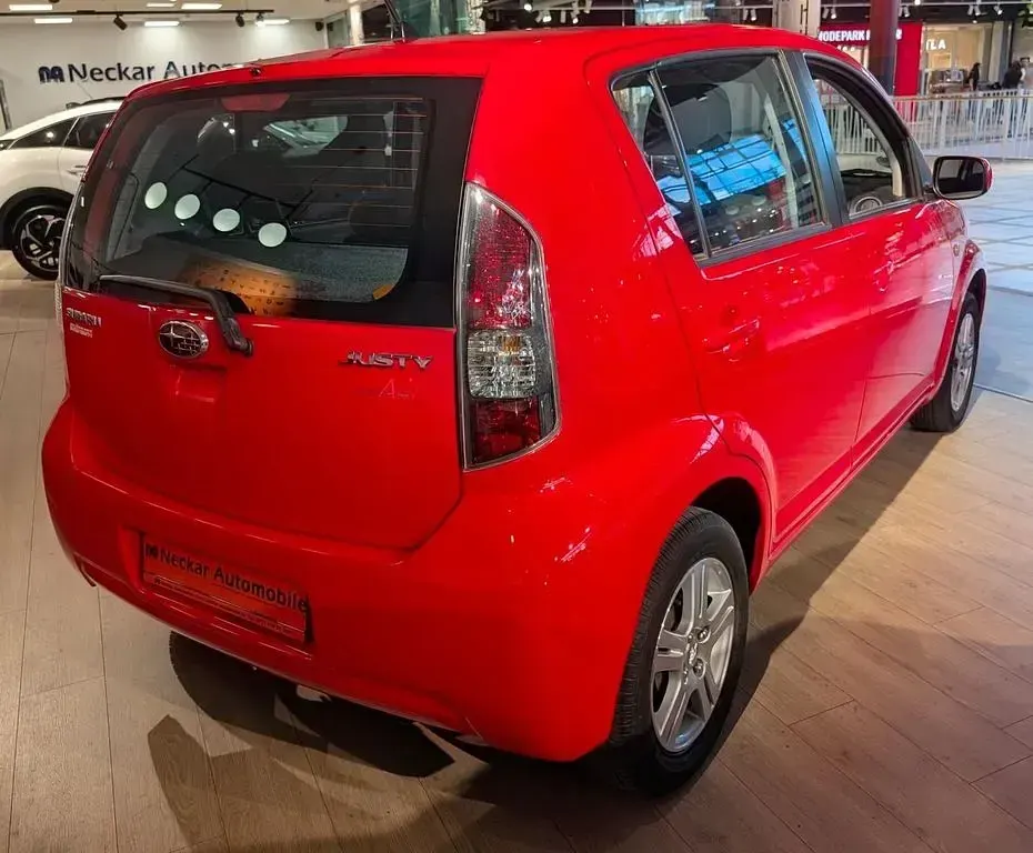 Gebraucht Subaru Justy Active 69 PS (50 kW) 2010 Rot Kleinwagen