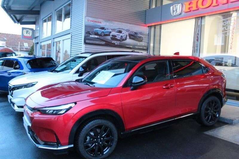 Vermilion red pearl (metallic) Gebraucht 2023 Honda e:Ny1 Advance SUV | 34.990 € (Teuer) - Bild 1/4