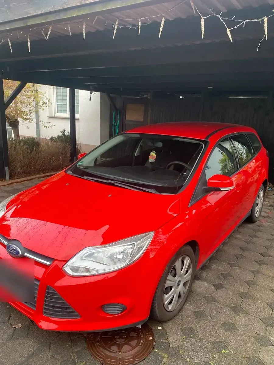 Używany Ford Focus 150 KM (110 kW) 2013 Czerwony Kombi