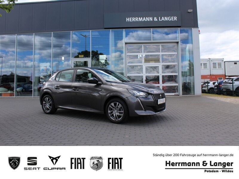 Grau / platiniumgrau (metallic) Gebraucht 2022 Peugeot 208 Active Kleinwagen | 12.990 € (Fairer Preis) - Bild 1/4