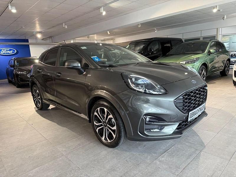Gebraucht Ford Puma ST-Line 155 PS (114 kW) 2024 Lackierung metallic "magnetic grau" grau Coupé