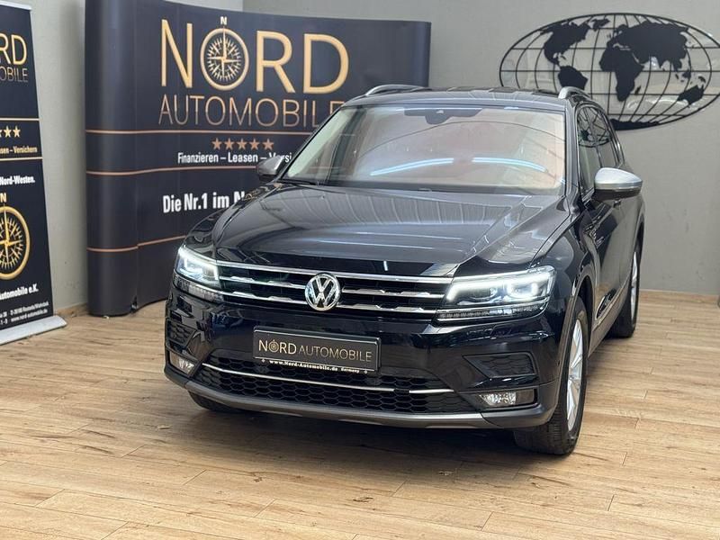 Deep black perleffek (metallic) Gebraucht 2021 VW Tiguan Allspace Highline SUV | 26.489 € (Superpreis) - Bild 1/3