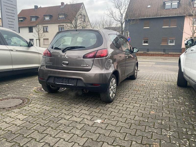 Gebraucht Mitsubishi Colt 75 PS (55 kW) 2011 Braun Kleinwagen