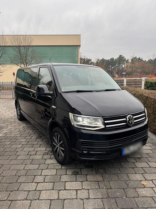 Schwarz Gebraucht 2016 VW Caravelle Van / Kleinbus | 21.900 € - Bild 1/4