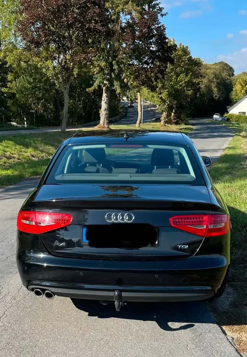 Używany Audi A4 150 KM (110 kW) 2014 Czarny Sedan/Limuzyna