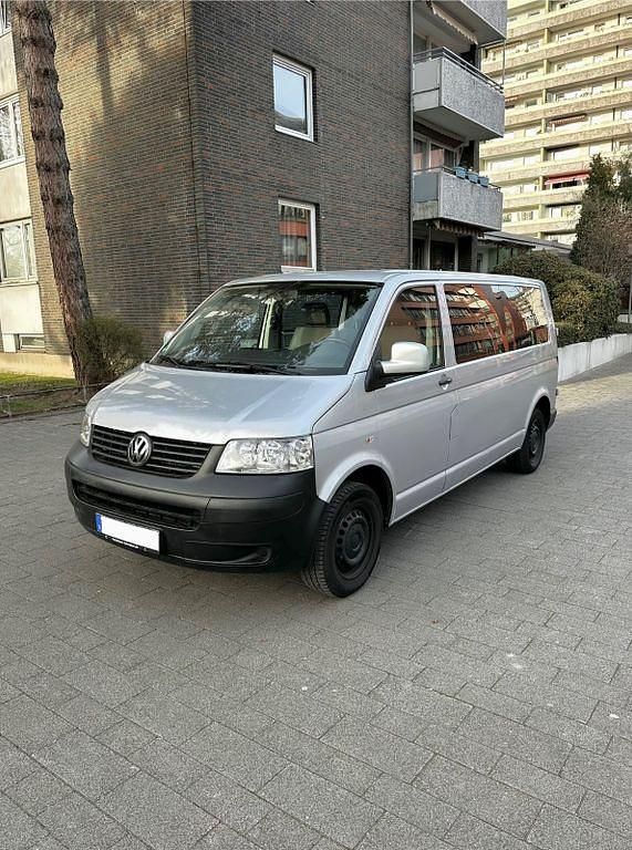 Silber Gebraucht 2009 VW Caravelle Van / Kleinbus | 9.600 € - Bild 1/4