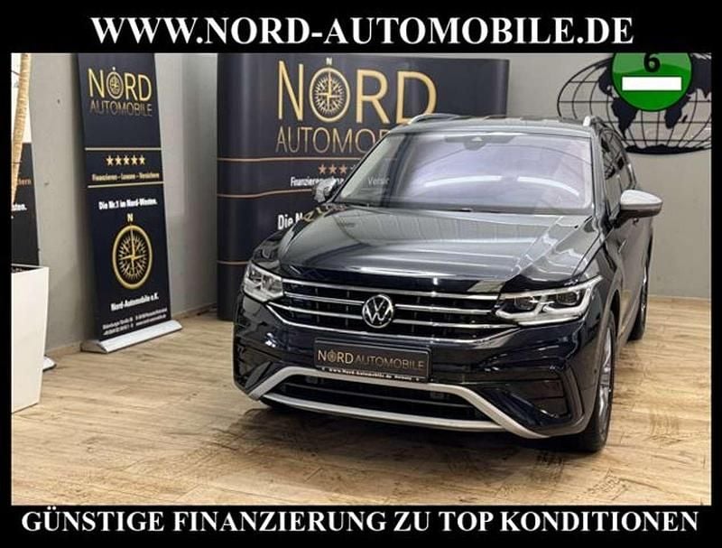 Deep black perleffek (metallic) Gebraucht 2022 VW Tiguan Allspace Elegance SUV | 35.900 € (Fairer Preis) - Bild 1/3