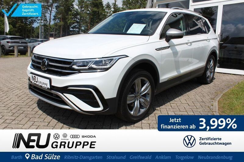 Pure white Gebraucht 2024 VW Tiguan Allspace Elegance SUV | 38.389 € (Guter Preis) - Bild 1/4