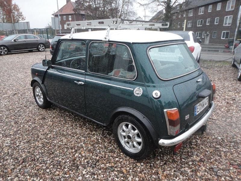 Second-hand Mini 1300 63 CP (46 kW) 1995 Verde Hatchback
