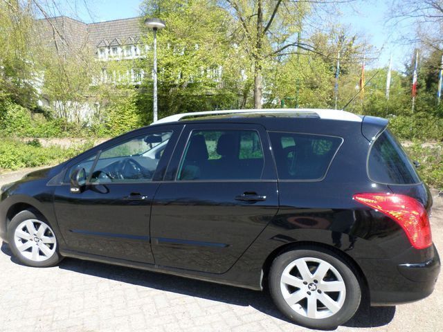 Gebraucht Peugeot 308 112 PS (82 kW) 2012 Schwarz metallic Kombi