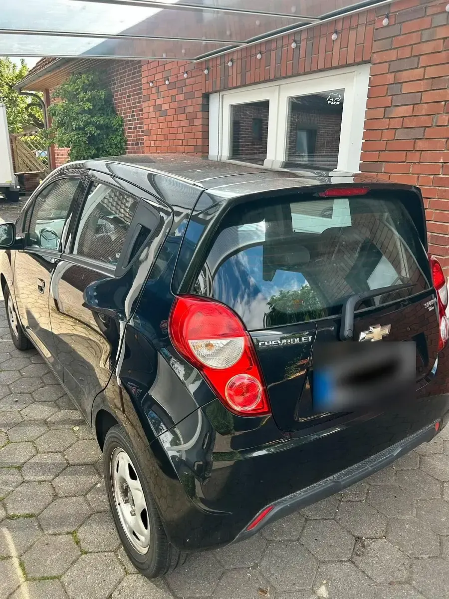 Gebraucht Chevrolet Spark 68 PS (50 kW) 2013 Schwarz Kleinwagen
