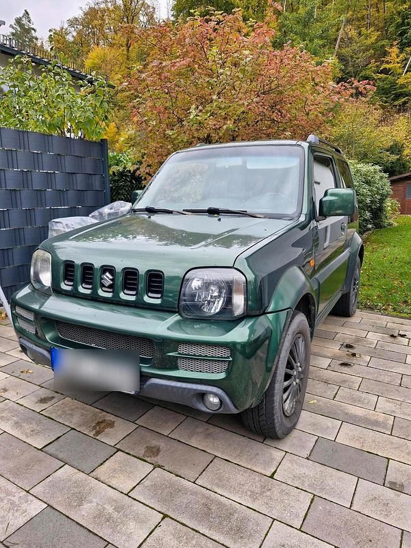 Grün Gebraucht 2009 Suzuki Jimny SUV | 6.499 € (Etwas zu teuer) - Bild 1/4