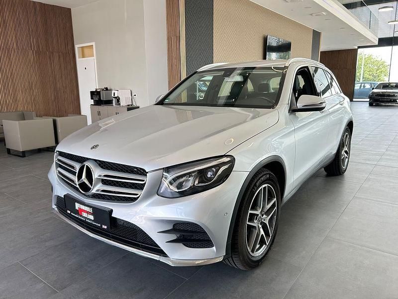 Silber Gebraucht 2018 Mercedes GLC220 AMG line SUV | 22.499 € (Fairer Preis) - Bild 1/4