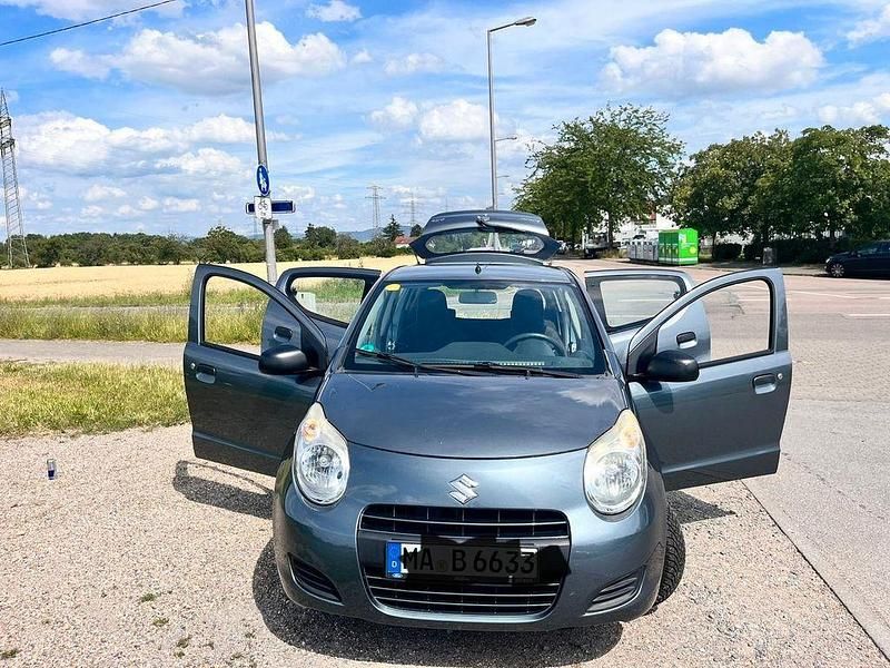 Grau Gebraucht 2012 Suzuki Alto Club Kleinwagen | 3.250 € (Fairer Preis) - Bild 1/4