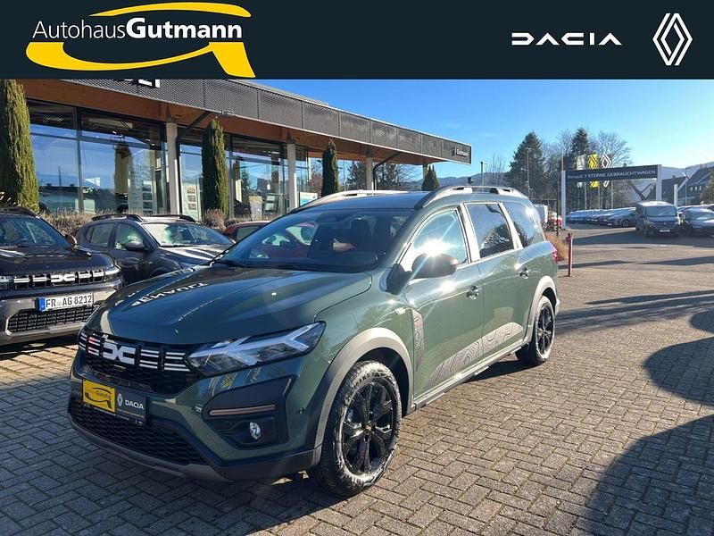 Safarigruengrau Gebraucht 2024 Dacia Jogger Extreme Van / Kleinbus | 24.990 € (Fairer Preis) - Bild 1/4