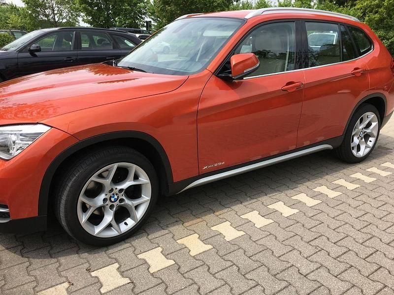 Orange Gebraucht 2012 BMW X1 xLine SUV | 10.900 € (Fairer Preis) - Bild 1/4
