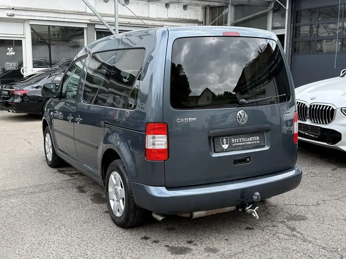 Second-hand VW Caddy Team 109 CP (80 kW) 2009 Gri Monovolum
