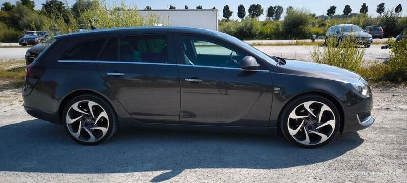 Grau Gebraucht 2013 Opel Insignia Sport Kombi | 6.900 € - Bild 1/4