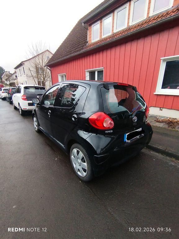 Gebraucht Toyota Aygo 68 PS (50 kW) 2007 Schwarz Kleinwagen