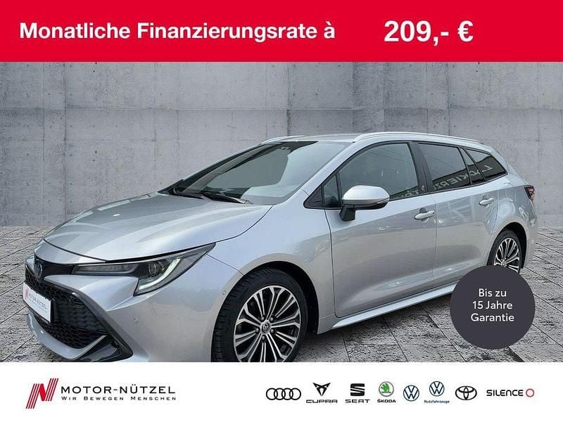 Silber Gebraucht 2022 Toyota Corolla Team Kombi | 23.490 € (Guter Preis) - Bild 1/4