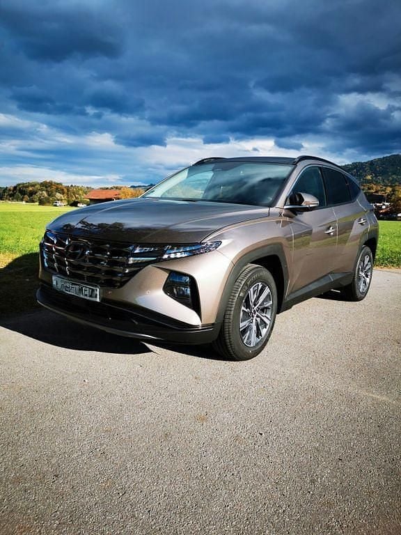 Braun Gebraucht 2021 Hyundai Tucson Select SUV | 25.999 € (Guter Preis) - Bild 1/4