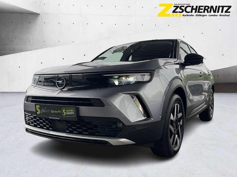 Quarz silber Gebraucht 2021 Opel Mokka Elegance SUV | 16.960 € (Fairer Preis) - Bild 1/4