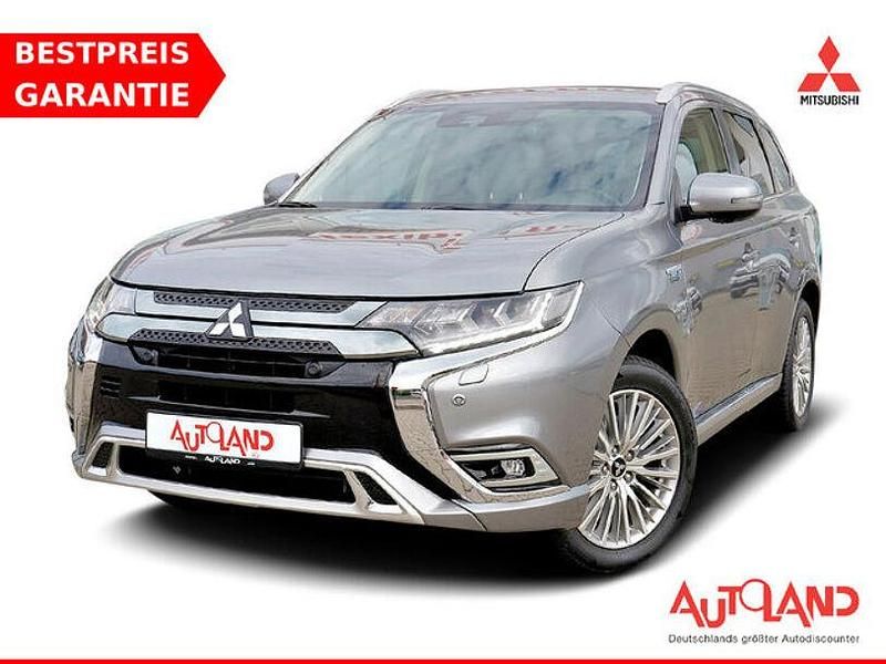 Grau Gebraucht 2022 Mitsubishi Outlander P-HEV SUV | 28.990 € (Teuer) - Bild 1/4