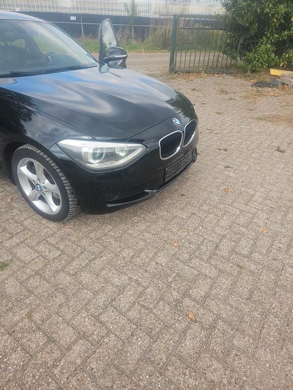 Schwarz Gebraucht 2013 BMW 120 Sport Line Kleinwagen | 7.800 € (Guter Preis) - Bild 1/4