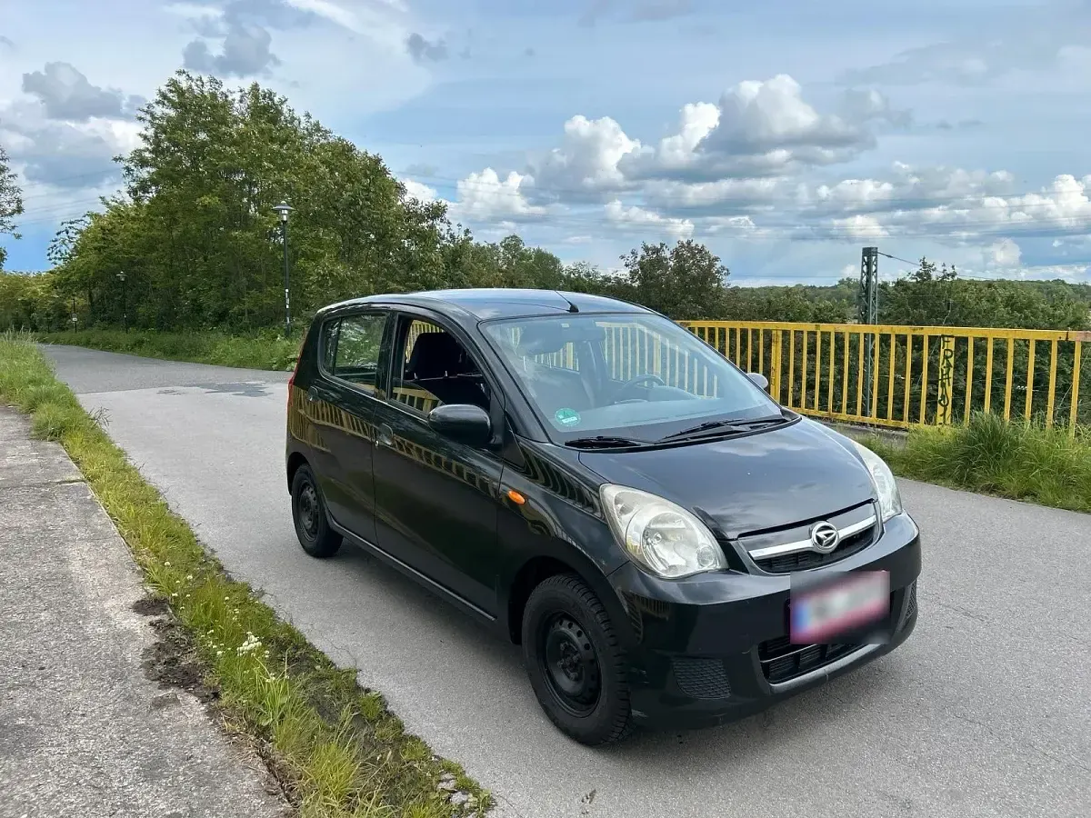 Gebraucht Daihatsu Cuore 70 PS (51 kW) 2007 Schwarz Kleinwagen
