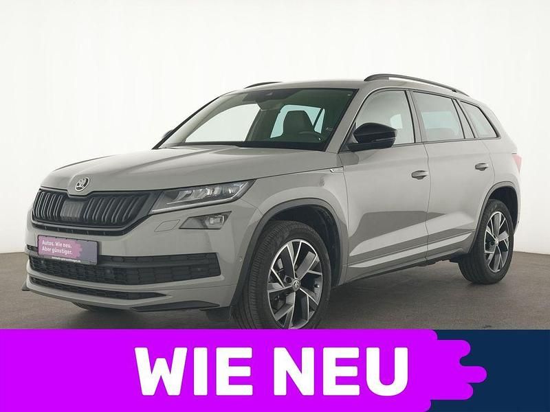 Grau Gebraucht 2021 Skoda Kodiaq SportLine SUV | 29.336 € (Fairer Preis) - Bild 1/4