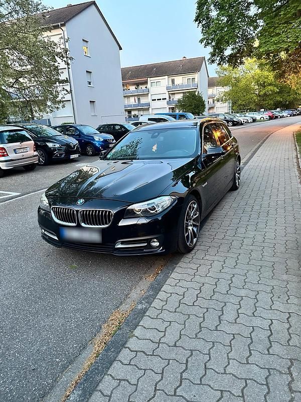 Second-hand BMW 520 184 CP (135 kW) 2014 Negru Break