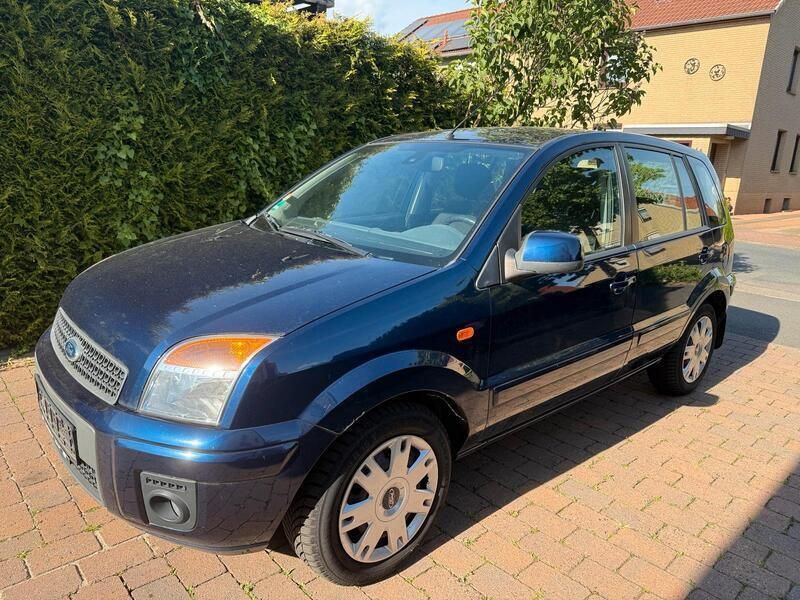 Blau Gebraucht 2010 Ford Fusion Limousine | 3.499 € (Fairer Preis) - Bild 1/4